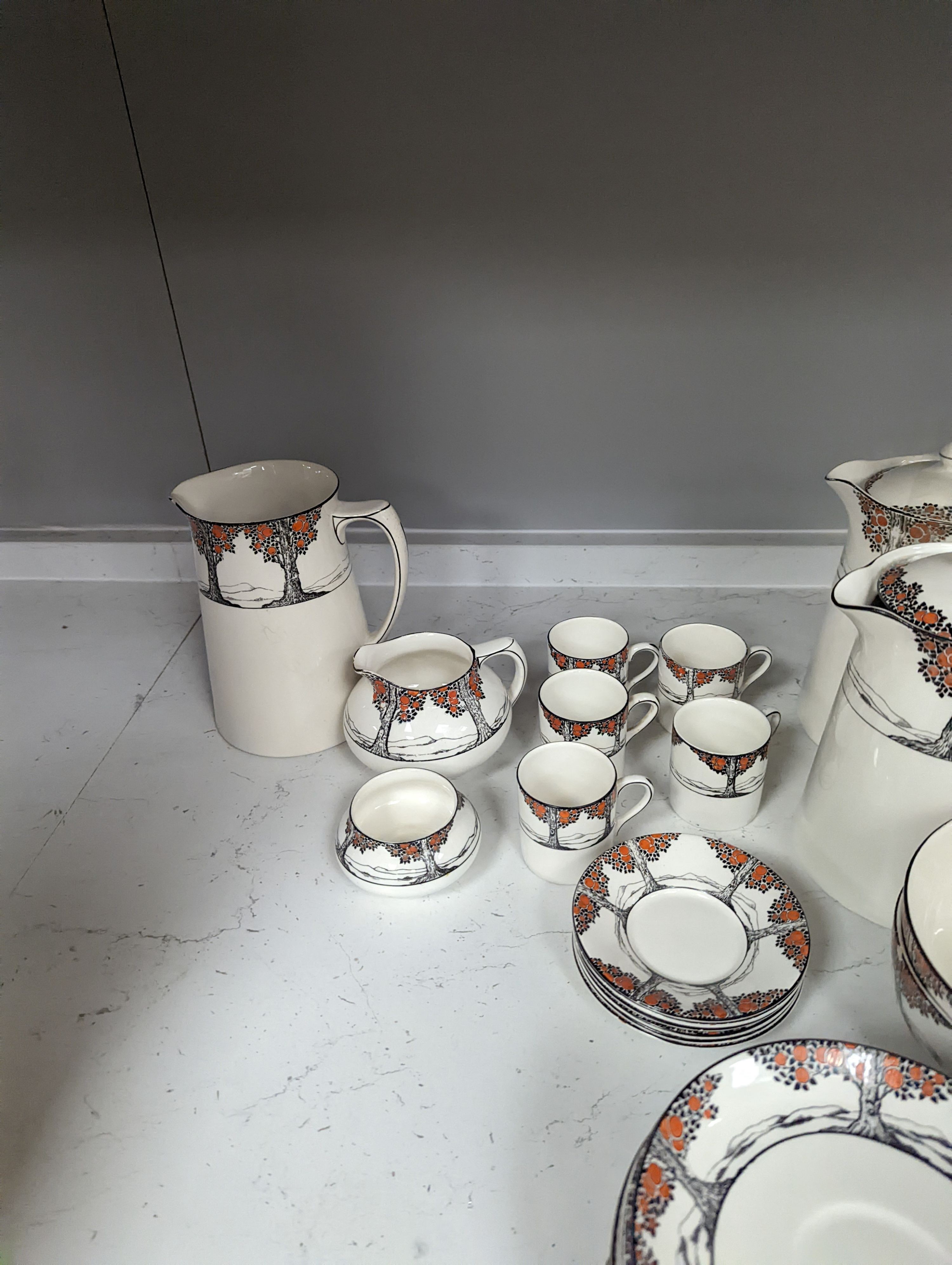 A Crown Ducal Orange Tree pattern tea, coffee and part dinner service